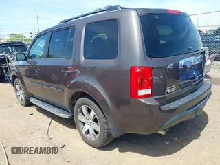 2012 Honda Pilot Touring with VIN 5FNYF4H9XCB083406, listed as a IAAI auction lot 42107651 with 217,678 mi miles. Bid and sale history available at carsss.com. Image 3.
