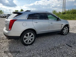 2011 Cadillac SRX Performance Collection z VIN 3GYFNBEY1BS527377, wystawiony jako Copart lot #57022915 z przebiegiem 193 905 mil mil oraz Tytuł czysty. Historia ofert i sprzedaży dostępna na DreamBid. Obrazek 3.