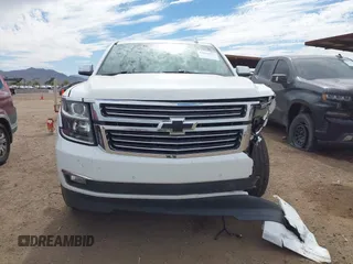 2015 Chevrolet Suburban LTZ with VIN 1GNSKKKC5FR691219, listed as a IAAI auction lot 41921973 with 169,119 mi miles and . Bid and sale history available at DreamBid. Image 12.