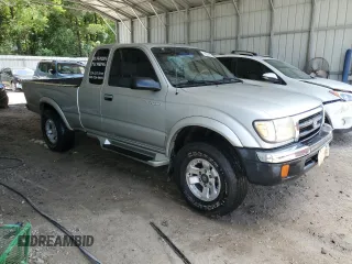 2000 Toyota Tacoma with VIN 4TAWN72N0YZ589681, listed as a Copart auction lot 55219145 with 204,946 mi miles and Salvage title. Bid and sale history available at DreamBid. Image 4.