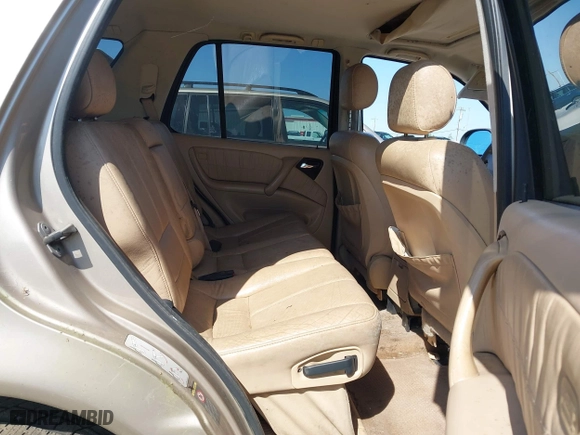 2001 Mercedes-Benz M-Class with VIN 4JGAB54E51A231565, listed as a IAAI auction lot 41943021 with 225,672 mi miles. Bid and sale history available at carsss.com. Image 8.
