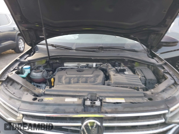 2023 Volkswagen Tiguan S z VIN 3VVRB7AX7PM036833, wystawiony jako IAAI lot #41827631 z przebiegiem 43 383 mil mil oraz . Historia ofert i sprzedaży dostępna na DreamBid. Obrazek 10.