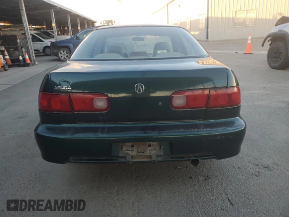 1999 Acura Integra with VIN JH4DB7665XS000928, listed as a Copart auction lot 80924344 with 198,981 mi miles and Salvage title. Bid and sale history available at DreamBid. Image 6.