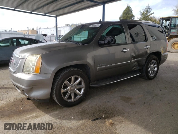 2012 GMC Yukon Denali with VIN 1GKS1EEFXCR236823, listed as a Copart auction lot 49830405 with 134,568 mi miles and Salvage Title. Bid and sale history available at carsss.com. Image 1.