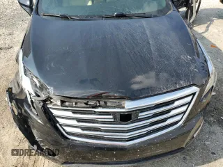 2017 Cadillac XT5 FWD with VIN 1GYKNARS0HZ283618, listed as a Copart auction lot 61640005 with 113,823 mi miles and Salvage title. Bid and sale history available at DreamBid. Image 12.