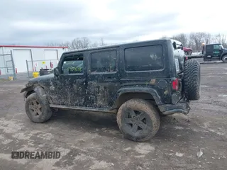 2012 Jeep Wrangler Unlimited Call of Duty MW3 z VIN 1C4BJWFG0CL202238, wystawiony jako IAAI lot #41956648 z przebiegiem 92 572 mil mil oraz . Historia ofert i sprzedaży dostępna na DreamBid. Obrazek 14.