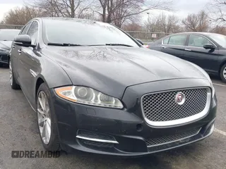 2014 Jaguar XJ with VIN SAJWA1CZ0E8V73966, listed as a IAAI auction lot 41887234 with 120,804 mi miles and . Bid and sale history available at DreamBid. Image 1.