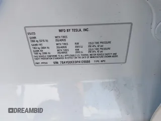 2023 Tesla Model Y Long Range z VIN 7SAYGDEE0PA128888, wystawiony jako IAAI lot #41410085 z przebiegiem 12 578 mil mil oraz . Historia ofert i sprzedaży dostępna na DreamBid. Obrazek 9.