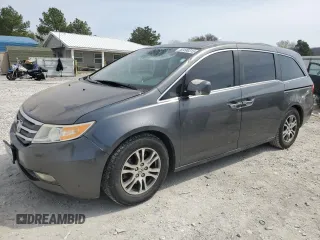 2013 Honda Odyssey EX-L with VIN 5FNRL5H60DB059044, listed as a Copart auction lot 50498315 with 142,799 mi miles and Salvage Title. Bid and sale history available at carsss.com. Image 1.