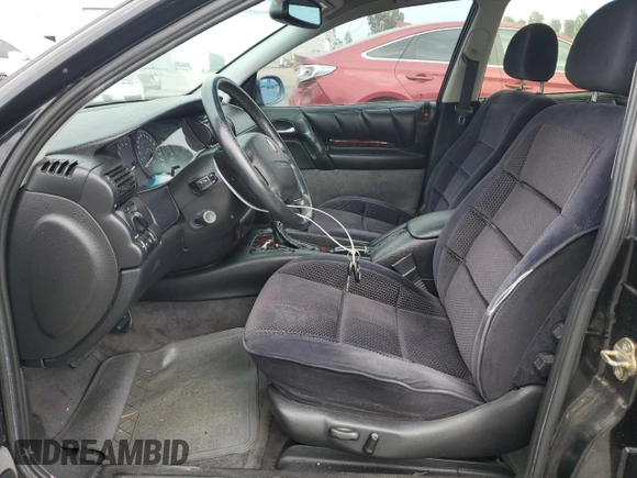 1997 Cadillac Catera z VIN W06VR52RXVR092016, wystawiony jako Copart lot #54067575 z przebiegiem 63 978 mil mil oraz Tytuł czysty. Historia ofert i sprzedaży dostępna na DreamBid. Obrazek 7.