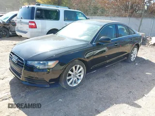 2014 Audi A6 Prestige z VIN WAUHMAFCXEN014381, wystawiony jako IAAI lot #41794551 z przebiegiem 133 649 mil mil oraz . Historia ofert i sprzedaży dostępna na DreamBid. Obrazek 19.