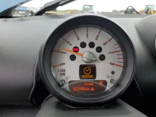 2012 MINI Countryman S with VIN WMWZC3C57CWL86423, listed as a Copart auction lot 57584195 with 102,184 mi miles and Salvage title. Bid and sale history available at DreamBid. Image 9.