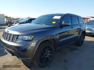 2021 Jeep Grand Cherokee Laredo X with VIN 1C4RJEAG2MC785610, listed as a IAAI auction lot 40578955 with 58,213 mi miles. Bid and sale history available at carsss.com. Image 2.
