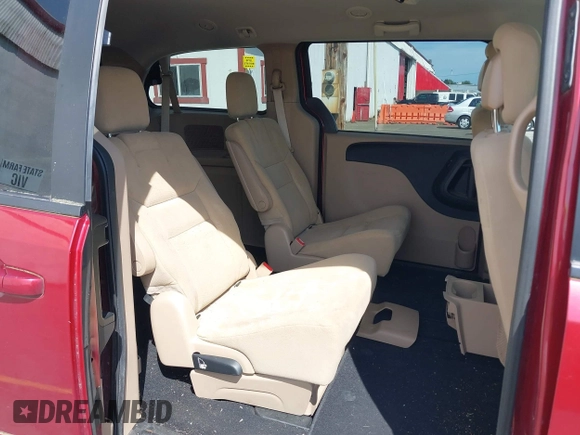 2015 Dodge Grand Caravan SXT with VIN 2C4RDGCG5FR600007, listed as a IAAI auction lot 42212626 with 81,864 mi miles and . Bid and sale history available at DreamBid. Image 8.