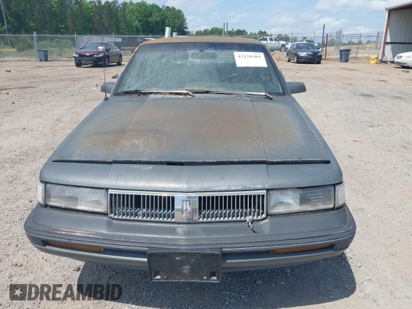 1989 Oldsmobile Cutlass Ciera with VIN 2G3AJ51NXK2439345, listed as a IAAI auction lot 42128301 with 241,434 mi miles and . Bid and sale history available at DreamBid. Image 6.