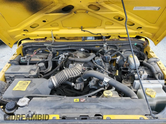 2009 Jeep Wrangler X with VIN 1J4FA241X9L765664, listed as a Copart auction lot 51802065 with 137,053 mi miles and Salvage Title. Bid and sale history available at DreamBid. Image 11.