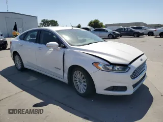 2013 Ford Fusion SE Hybrid z VIN 3FA6P0LU6DR325719, wystawiony jako Copart lot #55777715 z przebiegiem 152 478 mil mil oraz Szkoda całkowita • Salvage title. Historia ofert i sprzedaży dostępna na DreamBid. Obrazek 4.