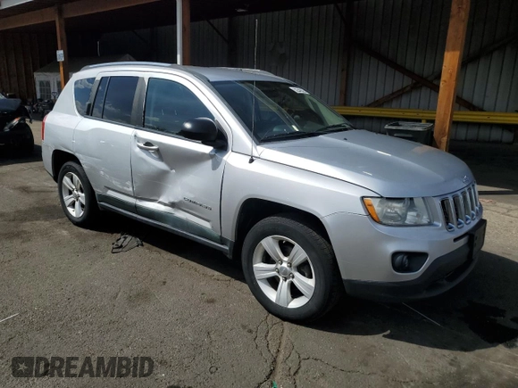 2011 Jeep Compass Latitude with VIN 1J4NF1FB6BD263831, listed as a Copart auction lot 52542625 with 160,743 mi miles and Salvage Title. Bid and sale history available at DreamBid. Image 4.