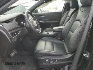 2023 Cadillac XT4 AWD Sport z VIN 1GYFZFR45PF128521, wystawiony jako Copart lot #53185325 z przebiegiem 17 657 mil mil oraz Szkoda całkowita • Salvage title. Historia ofert i sprzedaży dostępna na DreamBid. Obrazek 7.