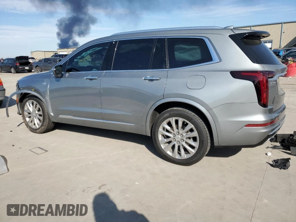 2023 Cadillac XT6 FWD Premium Luxury with VIN 1GYKPCRS4PZ124119, listed as a Copart auction lot 87836515 with 14,752 mi miles and Salvage title. Bid and sale history available at DreamBid. Image 2.