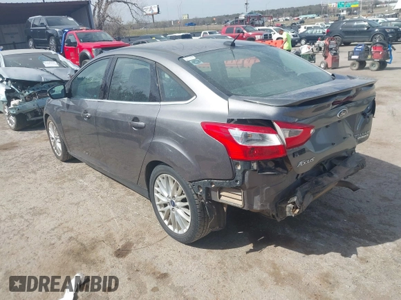 2014 Ford Focus Titanium with VIN 1FADP3J21EL299718, listed as a IAAI auction lot 41788080 with 91,748 mi miles. Bid and sale history available at carsss.com. Image 3.