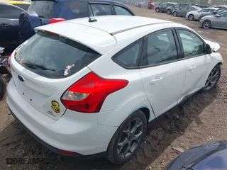 2013 Ford Focus SE with VIN 1FADP3K26DL345721, listed as a IAAI auction lot 41929799 with 143,713 mi miles. Bid and sale history available at carsss.com. Image 4.