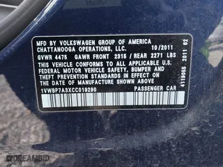2012 Volkswagen Passat SE with VIN 1VWBP7A3XCC019290, listed as a IAAI auction lot 41728353 with 117,281 mi miles. Bid and sale history available at carsss.com. Image 9.