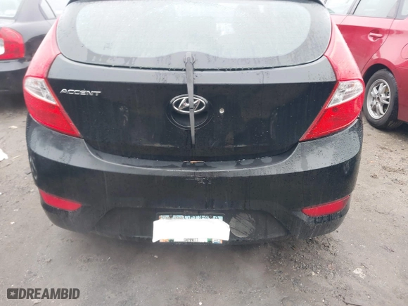 2013 Hyundai Accent GL with VIN KMHCT5AE4DU138789, listed as a IAAI auction lot 41536803 with 162,212 mi miles. Bid and sale history available at carsss.com. Image 6.