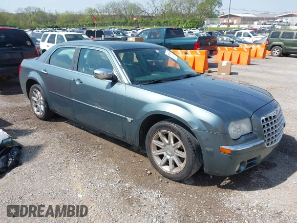 2006 Chrysler 300 C with VIN 2C3KA63H76H141246, listed as a IAAI auction lot 42035339 with 208,798 mi miles. Bid and sale history available at carsss.com. Image 1.