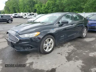 2018 Ford Fusion SE z VIN 3FA6P0LU8JR264630, wystawiony jako Copart lot #57036345 z przebiegiem 234 757 mil mil oraz Szkoda całkowita • Salvage title. Historia ofert i sprzedaży dostępna na DreamBid. Obrazek 1.