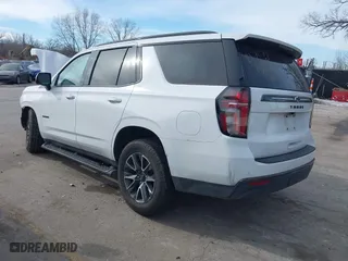 2021 Chevrolet Tahoe Z71 with VIN 1GNSKPKDXMR318664, listed as a IAAI auction lot 41382037 with 136,125 mi miles. Bid and sale history available at carsss.com. Image 3.