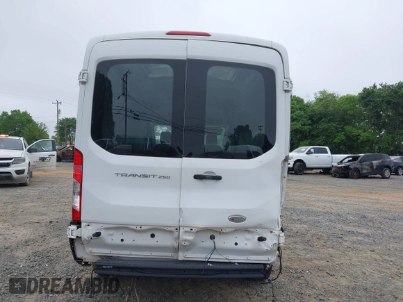2015 Ford Transit Cargo with VIN 1FTNR2CM4FKA26975, listed as a IAAI auction lot 39407096 with 150,786 mi miles and . Bid and sale history available at carsss.com. Image 16.