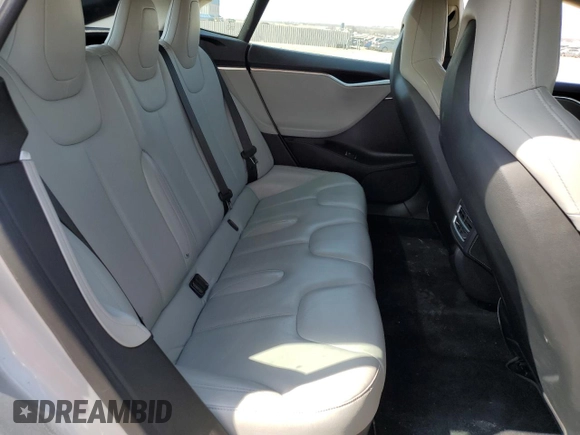 2016 Tesla Model S 90D with VIN 5YJSA1E25GF142104, listed as a Copart auction lot 50874815 with 84,917 mi miles and Salvage Title. Bid and sale history available at DreamBid. Image 10.