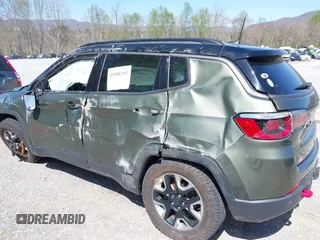 2018 Jeep Compass Trailhawk with VIN 3C4NJDDB0JT241163, listed as a IAAI auction lot 41986193 with 89,246 mi miles and . Bid and sale history available at DreamBid. Image 12.