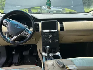 2016 Ford Flex SEL z VIN 2FMGK5C83GBA09724, wystawiony jako Copart lot #59036745 z przebiegiem 188 103 mil mil oraz Tytuł czysty. Historia ofert i sprzedaży dostępna na DreamBid. Obrazek 9.