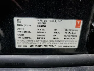 2017 Tesla Model S 100D z VIN 5YJSA1E21HF209847, wystawiony jako Copart lot #61848255 z przebiegiem 140 807 mil mil oraz Szkoda całkowita • Salvage title. Historia ofert i sprzedaży dostępna na DreamBid. Obrazek 13.