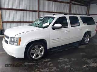 2014 Chevrolet Suburban LT with VIN 1GNSCJE05ER153658, listed as a IAAI auction lot 41867781 with 252,098 mi miles. Bid and sale history available at carsss.com. Image 17.