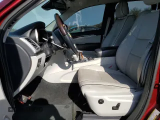 2019 Jeep Grand Cherokee Summit with VIN 1C4RJFJT3KC595525, listed as a Copart auction lot 77857234 with 67,104 mi miles and Salvage Title. Bid and sale history available at carsss.com. Image 7.