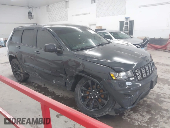 2017 Jeep Grand Cherokee Altitude with VIN 1C4RJFAG9HC886171, listed as a IAAI auction lot 41840198 with 125,616 mi miles and . Bid and sale history available at DreamBid. Image 1.