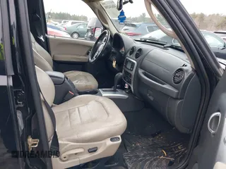 2004 Jeep Liberty Limited with VIN 1J8GL58K74W273411, listed as a IAAI auction lot 41634398 with 113,775 mi miles. Bid and sale history available at carsss.com. Image 5.
