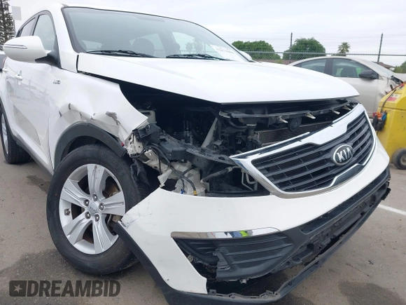 2013 Kia Sportage LX with VIN KNDPBCA21D7356092, listed as a IAAI auction lot 42111086 with 102,521 mi miles and . Bid and sale history available at carsss.com. Image 6.