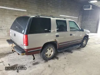 1998 GMC Yukon with VIN 1GKEC13R9WJ715363, listed as a Copart auction lot 81483814 with 186,437 mi miles and Salvage Title. Bid and sale history available at carsss.com. Image 3.