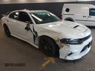 2019 Dodge Charger Scat Pack z VIN 2C3CDXGJ4KH674406, wystawiony jako IAAI lot #42083857 z przebiegiem 54 510 mil mil oraz . Historia ofert i sprzedaży dostępna na DreamBid. Obrazek 1.