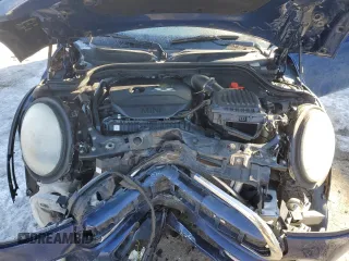 2014 MINI Hardtop S with VIN WMWXM7C51ET986340, listed as a Copart auction lot 42390825 with 71,558 mi miles and Salvage Title. Bid and sale history available at DreamBid. Image 11.