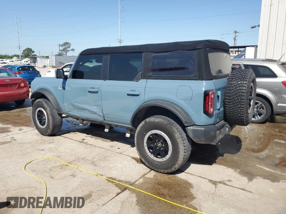 2022 Ford Bronco with VIN 1FMEE5DP3NLB62749, listed as a Copart auction lot 52227435 with 59,444 mi miles and Salvage Title. Bid and sale history available at DreamBid. Image 2.