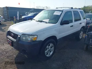 2005 Ford Escape XLT with VIN 1FMYU93145KD85599, listed as a IAAI auction lot 42036751 with 221,039 mi miles and . Bid and sale history available at DreamBid. Image 2.