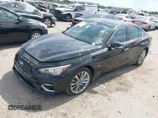2020 Infiniti Q50 Sport z VIN JN1EV7AP1LM201269, wystawiony jako IAAI lot #42358333 z przebiegiem 69 368 mil mil oraz . Historia ofert i sprzedaży dostępna na DreamBid. Obrazek 17.