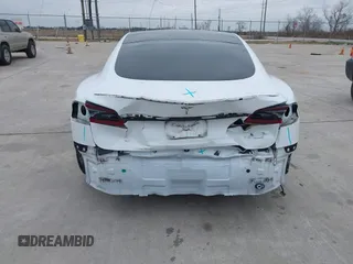2021 Tesla Model S Plaid z VIN 5YJSA1E64MF452744, wystawiony jako IAAI lot #41375136 z przebiegiem Nie podano mil oraz . Historia ofert i sprzedaży dostępna na DreamBid. Obrazek 15.