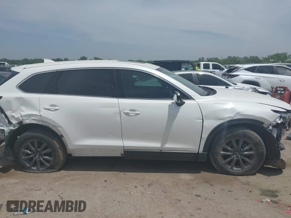 2021 Mazda CX-9 Touring with VIN JM3TCACY9M0526376, listed as a IAAI auction lot 42264478 with 74,671 mi miles and . Bid and sale history available at DreamBid. Image 13.