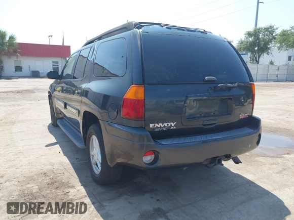 2003 GMC Envoy SLT with VIN 1GKES16S536169306, listed as a IAAI auction lot 42234834 with 239,144 mi miles and . Bid and sale history available at DreamBid. Image 3.